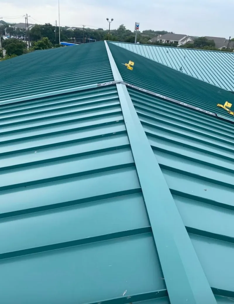 Green commercial metal roof ridge and valley for Metal Roof Repair in Lake Villa