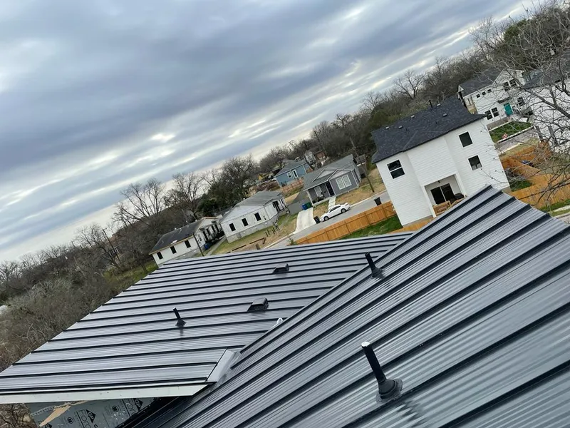 Standing seam metal roof panels with vents for Skylight Repair in Lake Villa